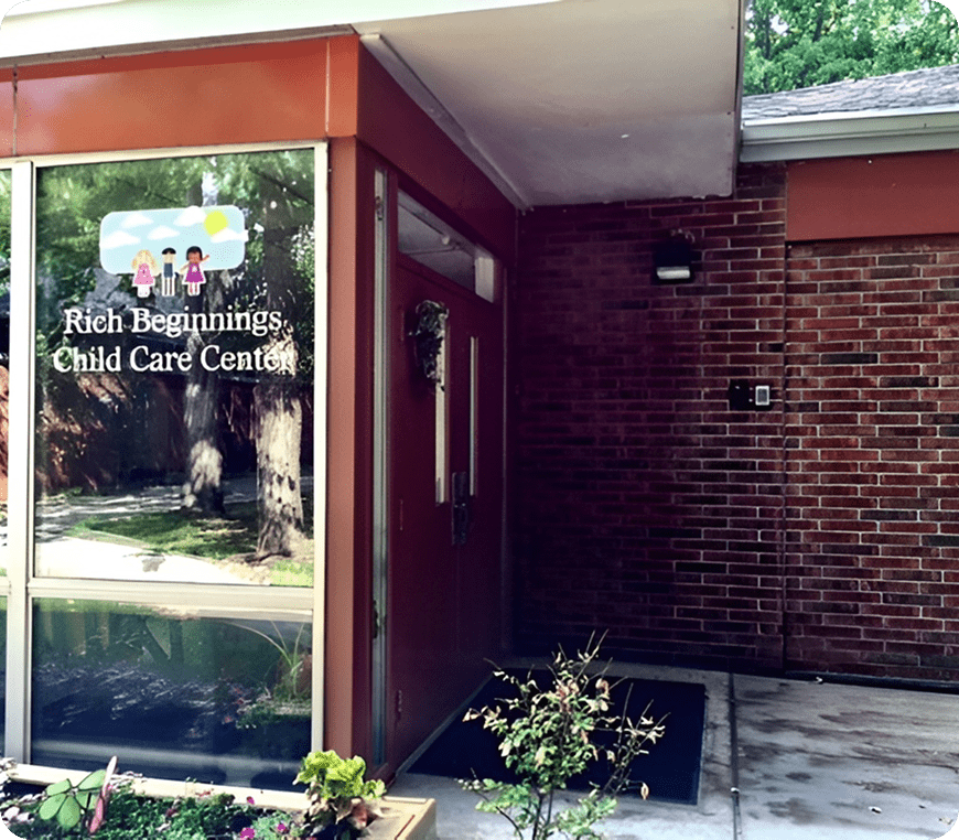 Child care center entrance with brick wall